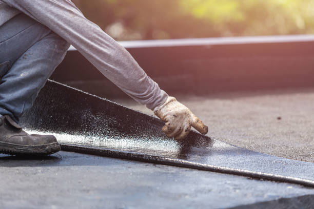 Professional Waterproofing technician working in Wilmington, IL
